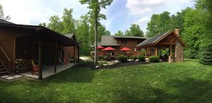 Garage, gazebo and rear view of house