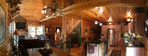 Open floor plan for log home - kitchen, dining and living room